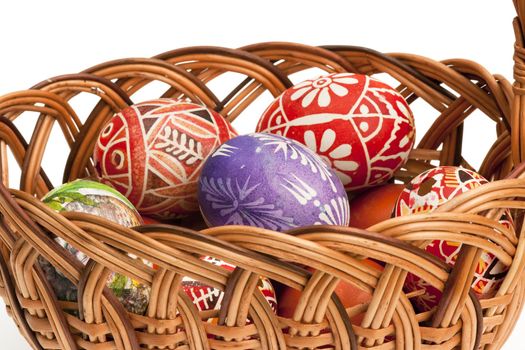 Detail of the painted Easter Eggs in wicker basket - basket full of Ester Eggs