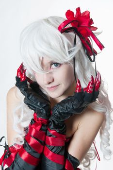 Girl in manga style suit on white