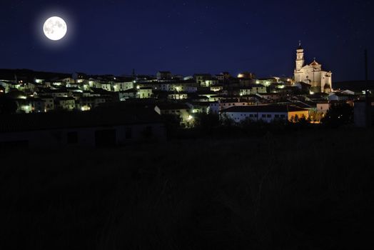 Village with cathedral under the light moon. 
Canon 40D 17-55mm f:2,8