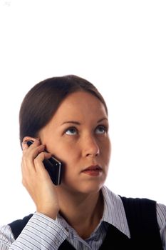 Dark haired business woman speaks by black mobile phone