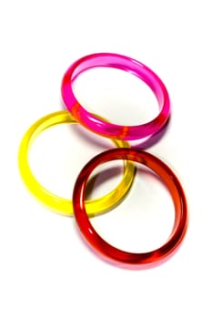 Three varicoloured rings on white background, abstractions