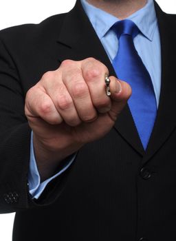 cropped shot of torso part of a man in black suit holding out house keys