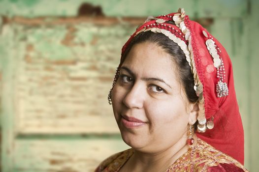 Portrait of a Muslim Woman in an Ornate Head Scarf