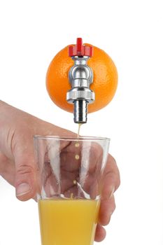 Orange with faucet and orange juice streaming into a glass, concept of freshness and healthy diet