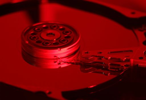 open computer hard disk in red light