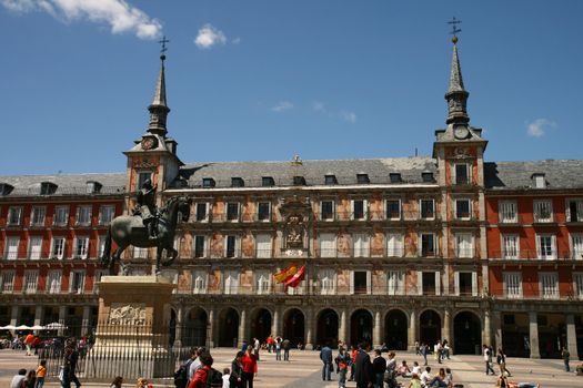 Plaza Mayor, at the heart of Madrid's historic downtown.
The Plaza Mayor has been the scene of many events from markets, bullfights, soccer games, public executions, and, during the Spanish Inquistion, "autos de fe" against supposed heretics and the executions of those condemned to death. The Plaza Mayor also has a ring of old and traditional shops and cafes under its porticoes. Celebrations for San Isidro, patron saint of Madrid, are also held here. The Plaza Mayor is now a major tourist attraction, visited by thousands of tourists a year