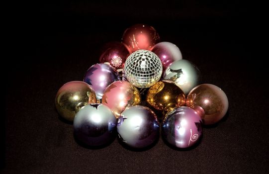 Christmas decoration with mirror sphere on black background