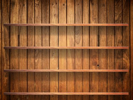 Empty four wood shelf on wood decorative wall