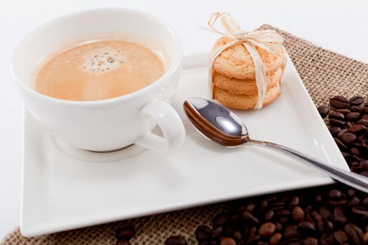 fresh aromatic coffee and cookies on wooden table 