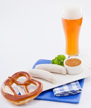 weisswurst white sausages and sweet mustard with pretzel  bavarian traditional food