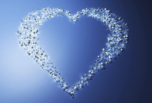 a group of many small diamonds have been put together to form a shape that represents a heart that is lying on a blue background, and a light over its left side illuminates the scene