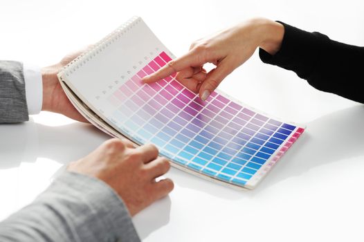 woman Choosing color from color scale