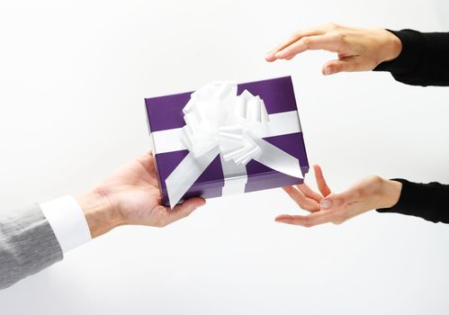guy giving a girl a valentine gift, top view, white background