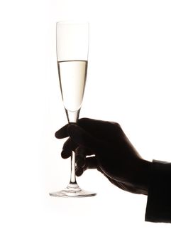 Glass of champagne in a man hand 