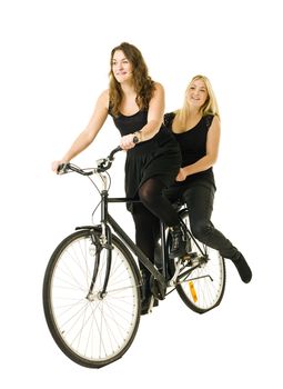 Two women on a bicycle isolated on white background