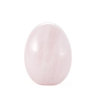 pink Quartz in the form of egg on light background