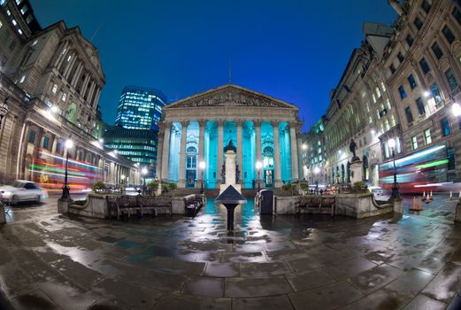 Night view of British financial heart, Bank of England and Royal Exchange. The photo was taken at a slow shutter speed wide-angle fisheye lens