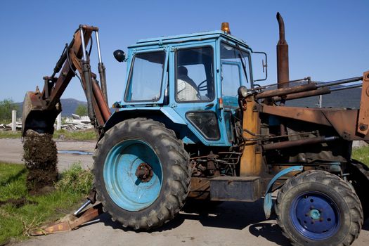 Wheel excavator to dig the ground against the blue sky