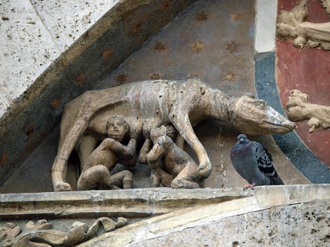 Siena - the town's emblem; a she-wolf suckling the infants Romulus and Remus.