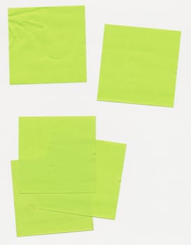 Assorted scrap paper notes on a white background.