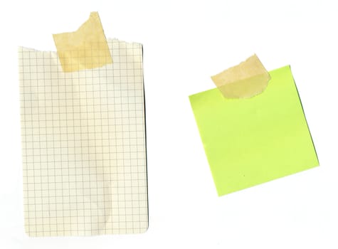 Assorted scrap paper notes on a white background.