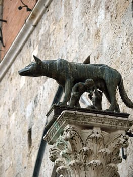 Siena - the town's emblem; a she-wolf suckling the infants Romulus and Remus.