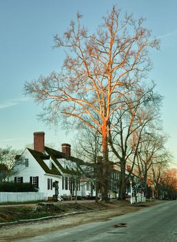 WILLIAMSBURG, VIRGINIA - DECEMBER 30: Sun rises over the restored houses on December 30, 2011. Colonial Williamsburg's 301 acres includes many restored buildings and houses