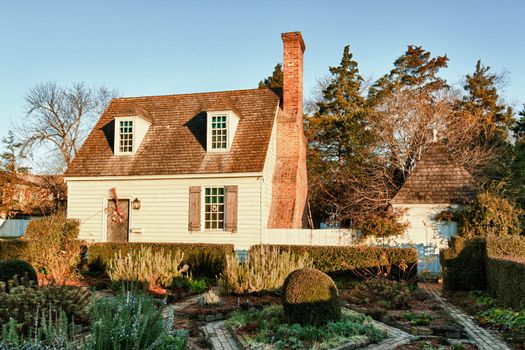 WILLIAMSBURG, VIRGINIA - DECEMBER 30: Sun rises on old house on December 30, 2011. Colonial Williamsburg's 301 acres includes many restored buildings and houses