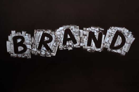 Brand written with chalk on a blackboard