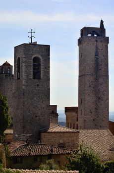 Two Medieval Stone Towers Bells San Gimignano Tuscany Italy