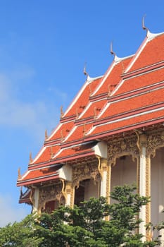 Vivid color of temple roof against the blue sky