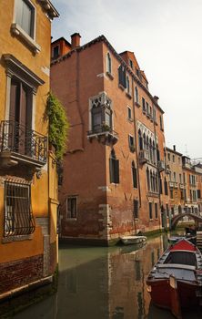 Small Canal Bridge Buildings Boats Reflections Venice Italy