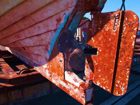 Close details of an old rust boat restoration wide angle view