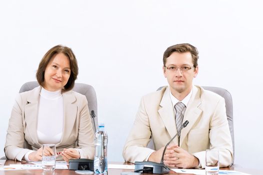 businessmen sitting in a chair at the table, communicate at the conference