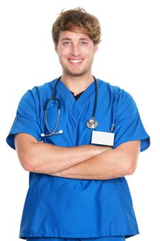 Medical portrait. Male nurse or young man doctor smiling happy and proud in blue scrubs isolated on white background. Young caucasian male medical professional.