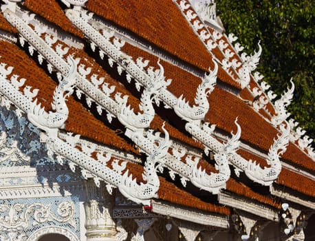 Gable apex on the roof of royal temple in thailand.