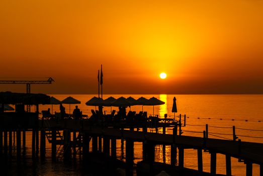 Pier Resort Silhouette at the Sunrise over sea