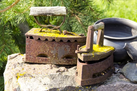 Ancient metal rusty mossy metal iron tools. Vintage retro objects.