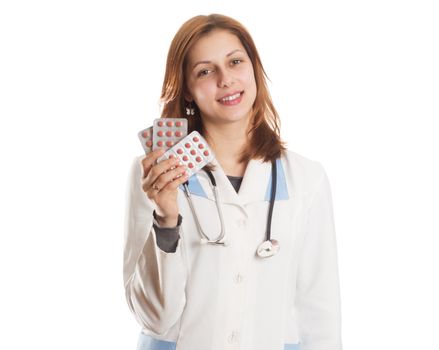 women doctor holding a blister  of pills on a white background isolated