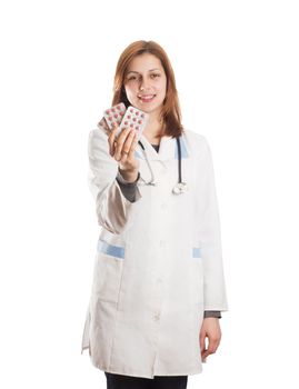 Doctor of the blister with pills on a white background isolated