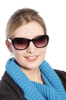 Close up portrait of blonde woman wearing sunglasses