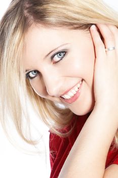 Charming blonde woman on a white background