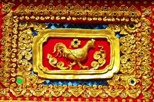 Native Thai style of chicken pattern on Buddhist temple