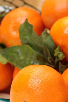 photo of Tangerines with leaves closeup