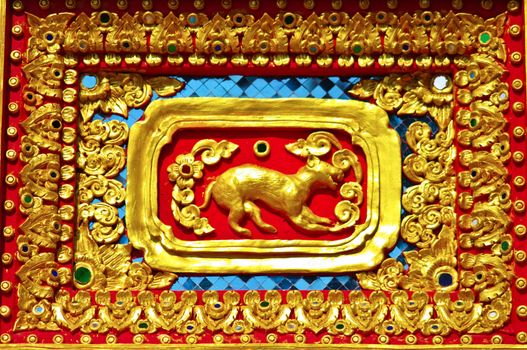 Native Thai style of dog pattern on Buddhist temple