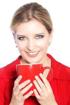 Woman drinking coffee over the white background