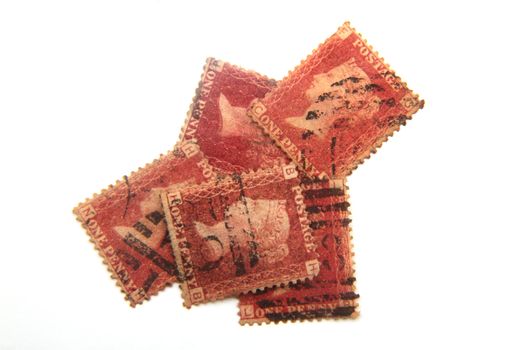 British penny red stamps on a white background.