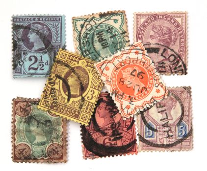 Assorted Victorian postage stamps on a white background.