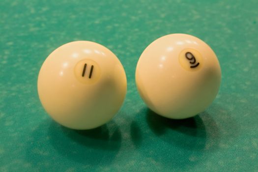 2 Billiard spheres on a green billiard table