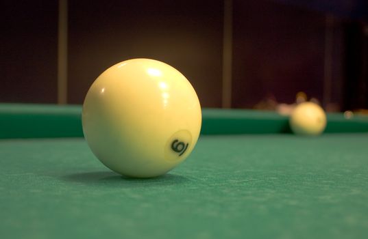 Billiard sphere on a green billiard table